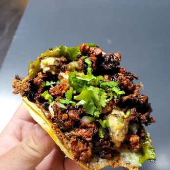 TACOS LOS CHOLOS signature dishes BurritoTacoPapa LokaPanela Cheese Taco